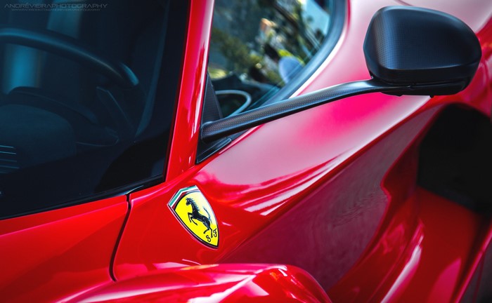 Red Ferrari LaFerrari sports car emblem