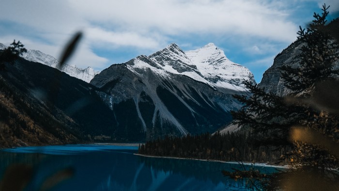 Snow-capped mountains and blue lake