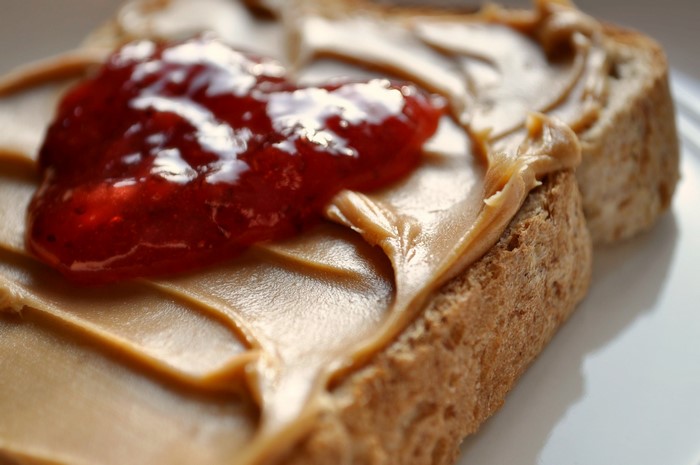 Peanut butter and jelly sandwich on bread