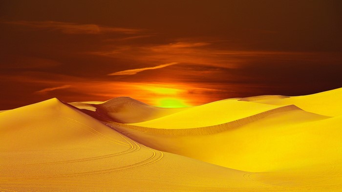 4K desert sand dunes at sunset
