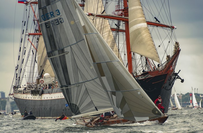 Sailboats racing on the water