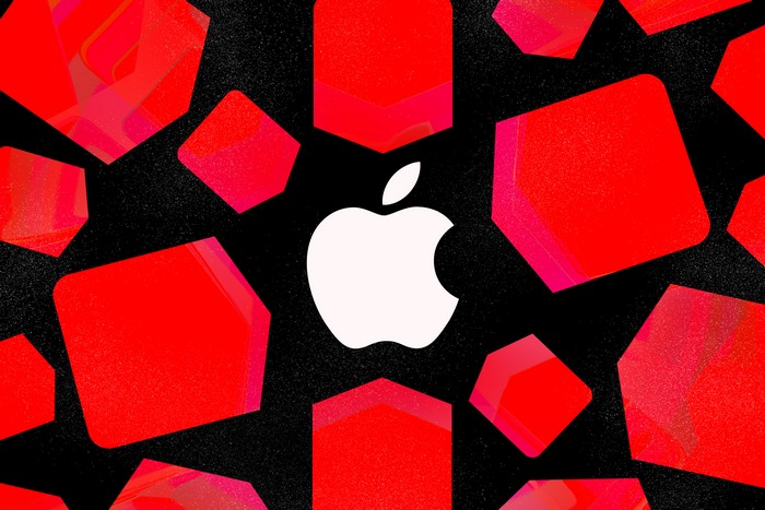 Apple logo surrounded by red geometric shapes