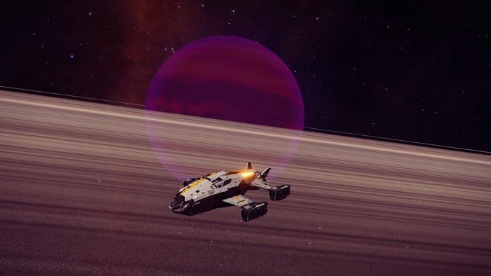 Spaceship flying through rings of a planet in Elite: Dangerous