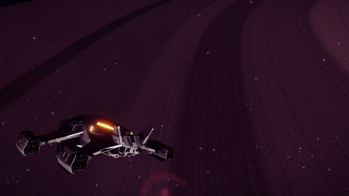 Spaceship near planet rings in Elite: Dangerous