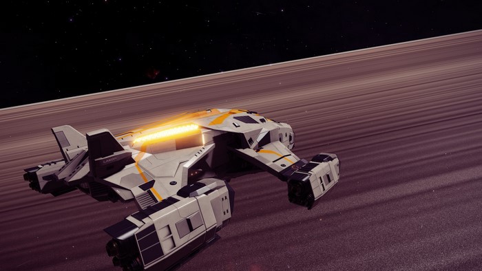 Spaceship flying near Saturn's rings in Elite: Dangerous