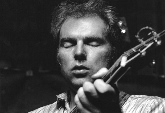 Van Morrison plays a stringed instrument