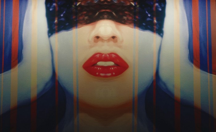 Woman with blindfold and red lipstick
