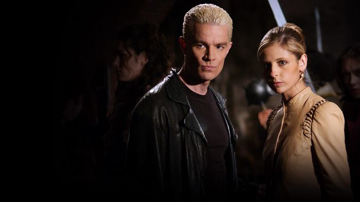 Spike and Buffy in a dark setting