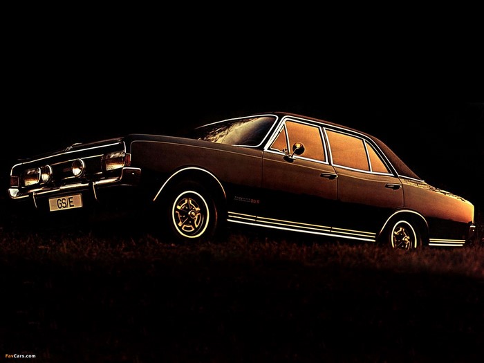 Opel Commodore GS/E sedan on grass at dusk