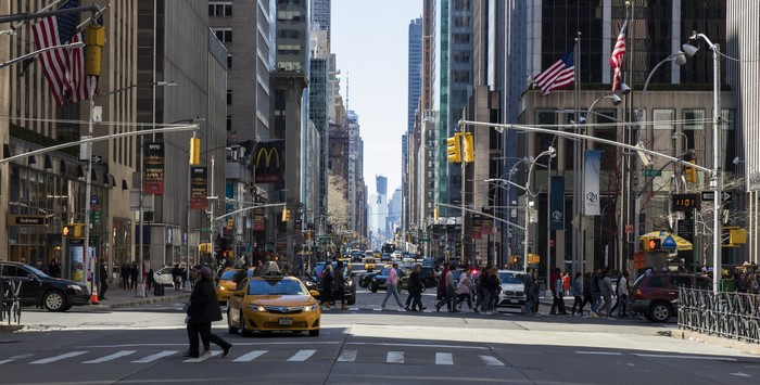 New York City Street with People and Taxis