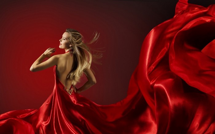 Woman in a flowing red dress