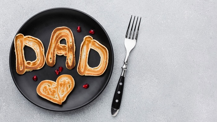 Pancakes spelling DAD on a plate