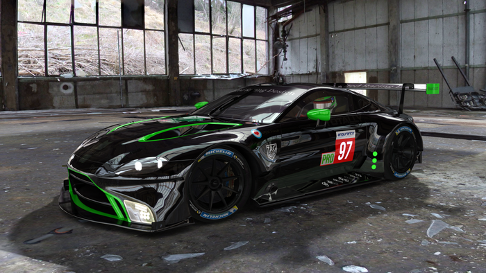 Black Aston Martin Vantage GT3 race car with green accents