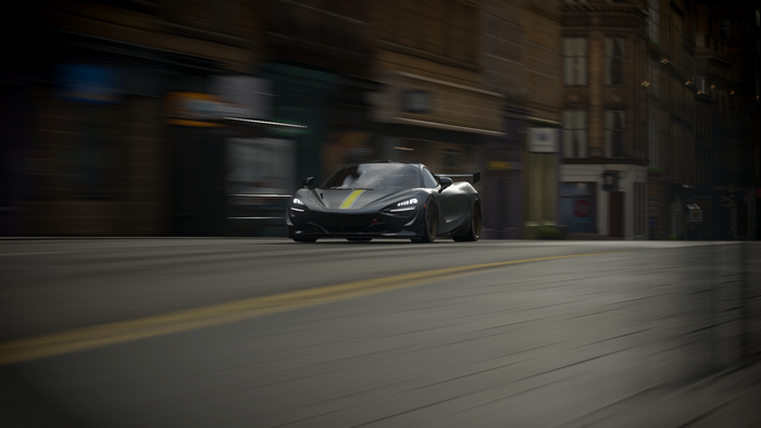 McLaren 720S driving on a city street