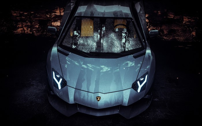 Silver Lamborghini Aventador with water droplets