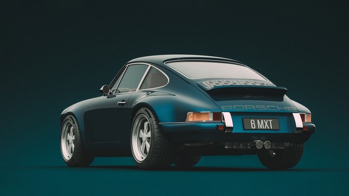 Rear view of a teal Porsche 911 sports car