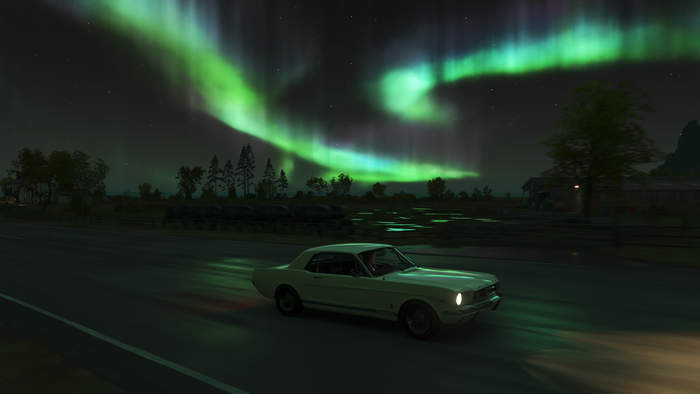 White Ford Mustang driving under Aurora Borealis in Forza Horizon 4