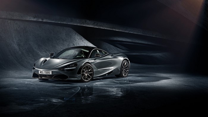 McLaren 720S supercar in a dark, textured environment