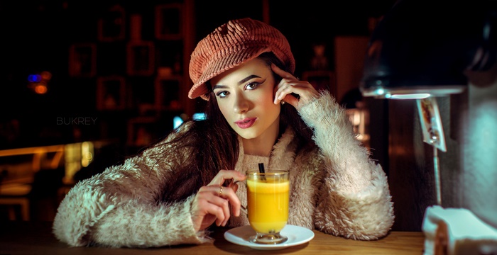 Woman in Hat with Drink
