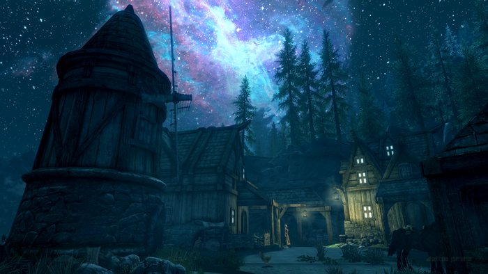 The Elder Scrolls V: Skyrim in-game screenshot of a village at night