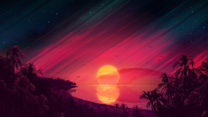 Sunset over a tropical beach with palm trees