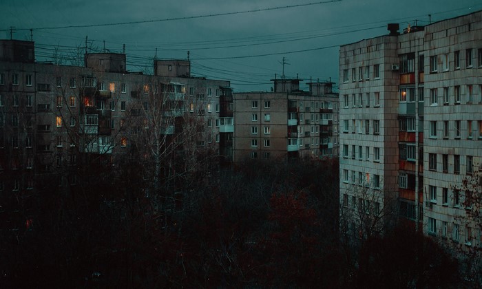 Gloomy city block of flats in Russia during fall