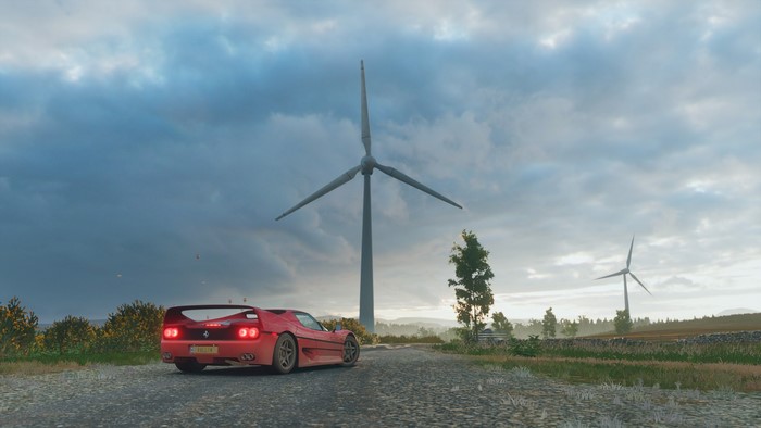 Red Ferrari F40 in Forza Horizon 4 with Wind Turbines