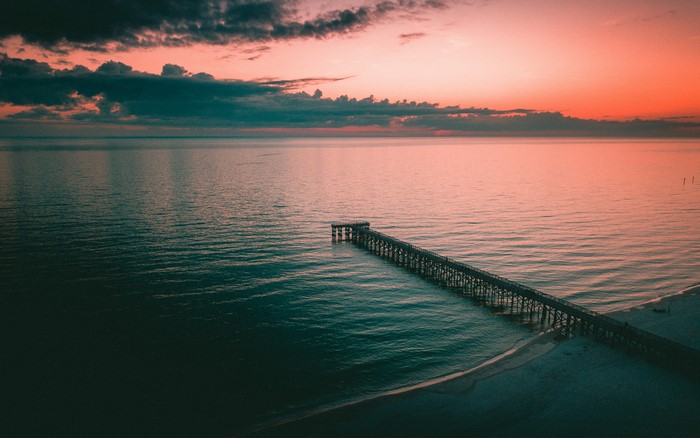 4K dock on the sea at sunset