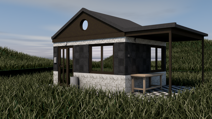 Small modern house in a grassy field
