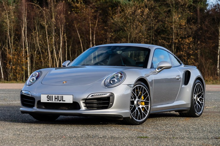 Silver Porsche 911 Turbo parked outdoors
