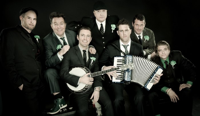 Dropkick Murphys band members posing for a photo