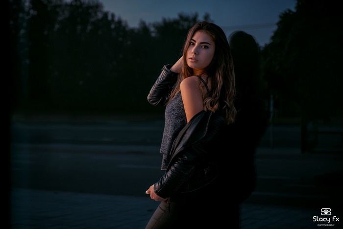 Portrait of Young Woman in Leather Jacket
