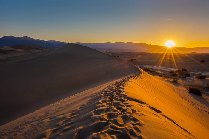 Sunrise over sand dunes in Death Valley