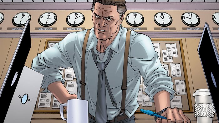 Perry White in front of world clocks