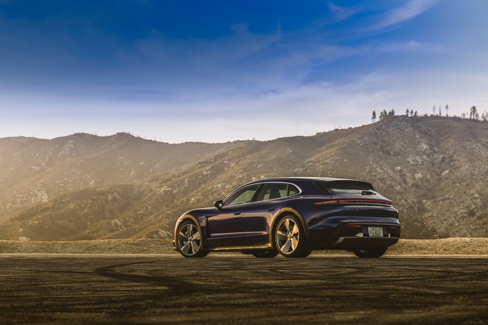 Porsche Taycan Turbo S parked on a dirt road