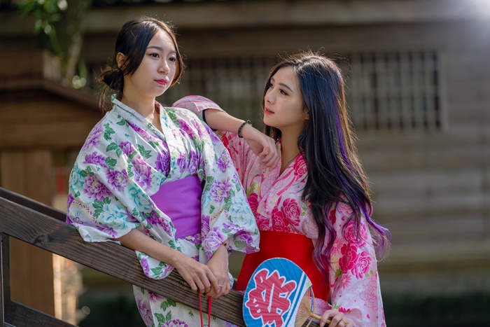 Two Asian women in kimonos