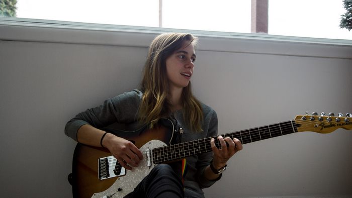 Julien Baker plays a Fender Telecaster guitar