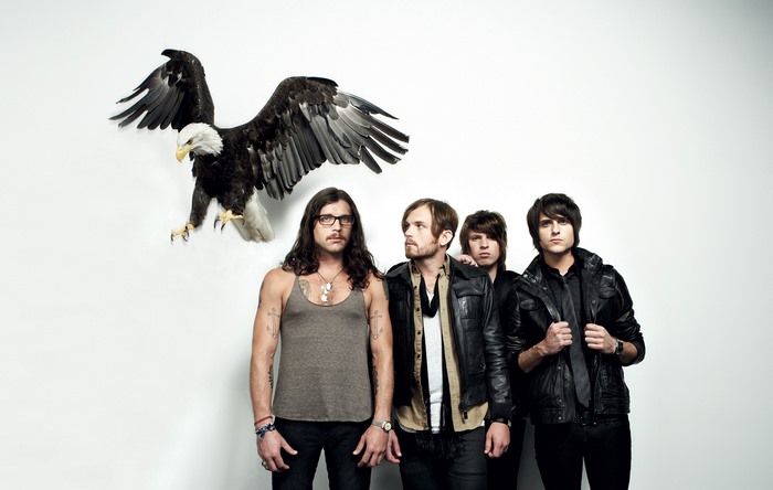 Kings Of Leon with a taxidermy eagle