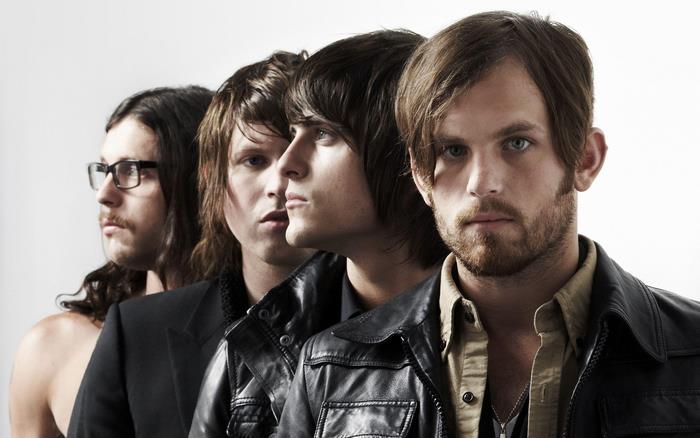 Kings Of Leon band members posing