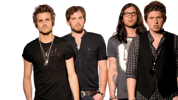 Kings Of Leon band members posing
