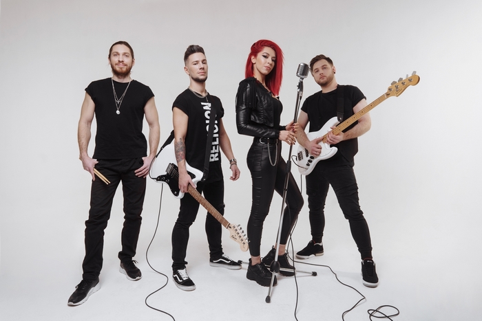 LASCALA HD band posing with instruments
