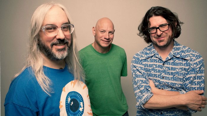 Dinosaur Jr. band members posing for a photo