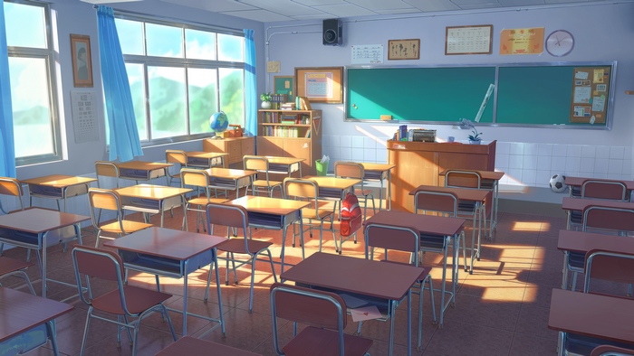 Classroom with desks and chairs in sunlight