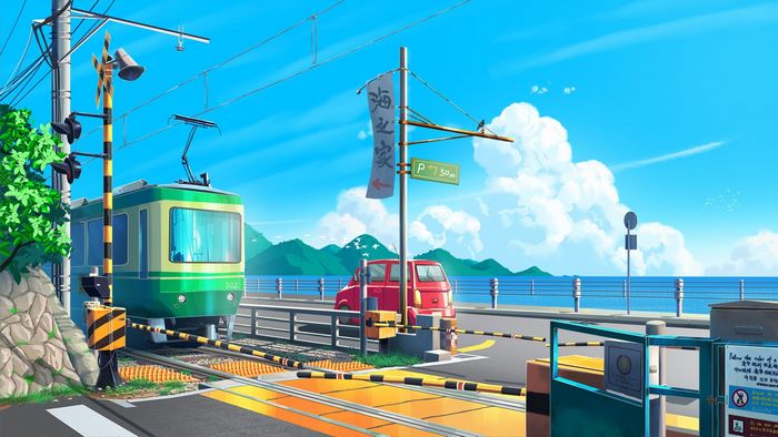 Train and car at a railroad crossing by the sea