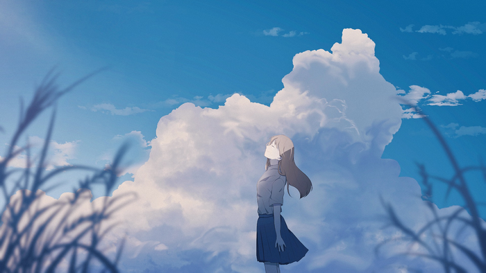 Girl looking up at clouds