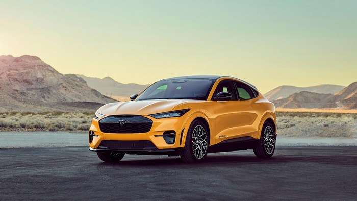 Yellow Ford Mustang Mach-E 4K in desert landscape