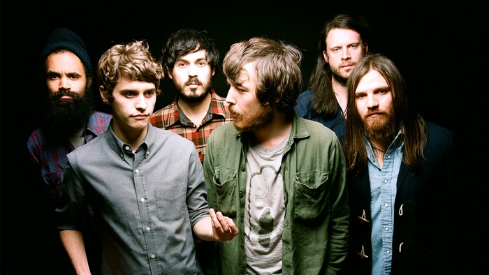 Fleet Foxes band members posing for a photo