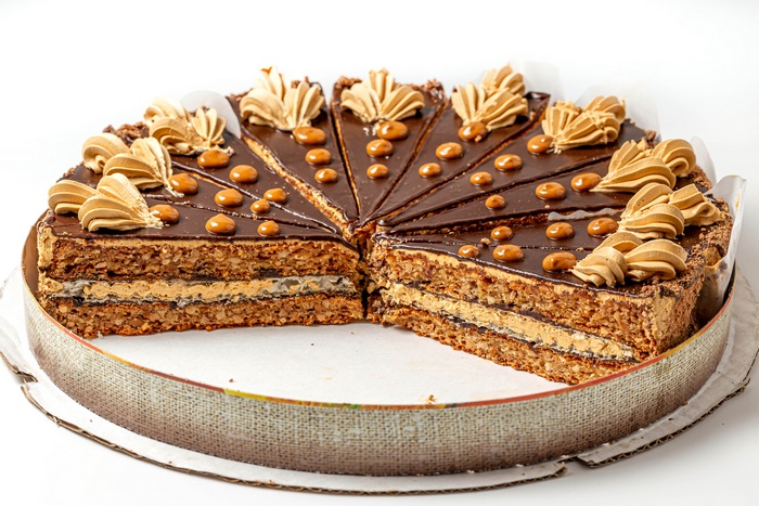 Chocolate cake with caramel and cream decorations
