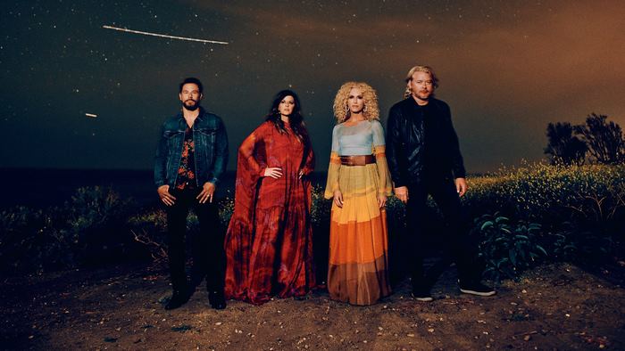 Little Big Town standing under the night sky