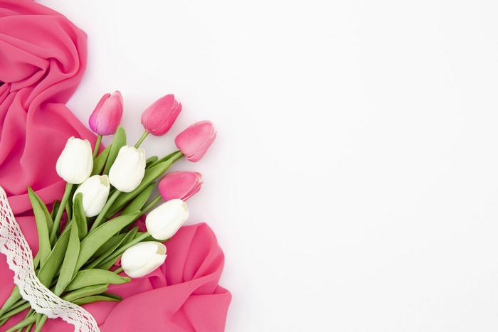 Pink and white tulips with pink fabric and lace
